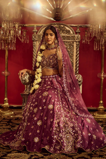 Dark purple silk lehenga with net dupatta