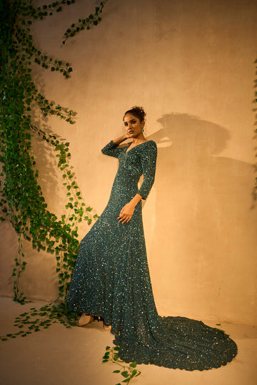 Bottle green hand embroidered long trail gown in georgette