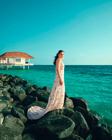 White hand embroidered tail gown in georgette
