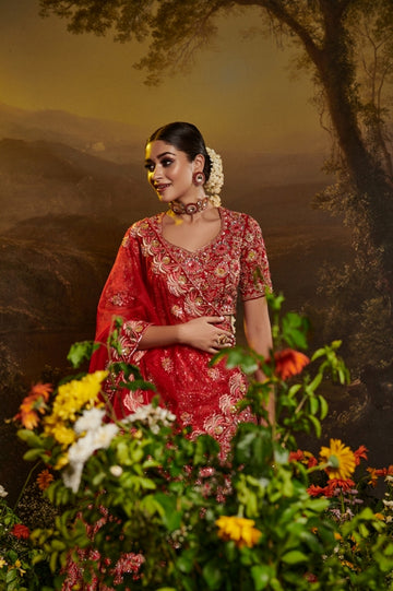 Red on red hand embroidered lehenga in silk