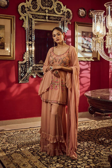Peach peplum sharara suit set in georgette