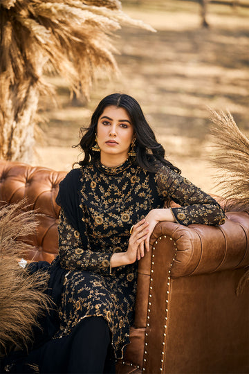 Black beaded peplum with Sharara and dupatta in georgette