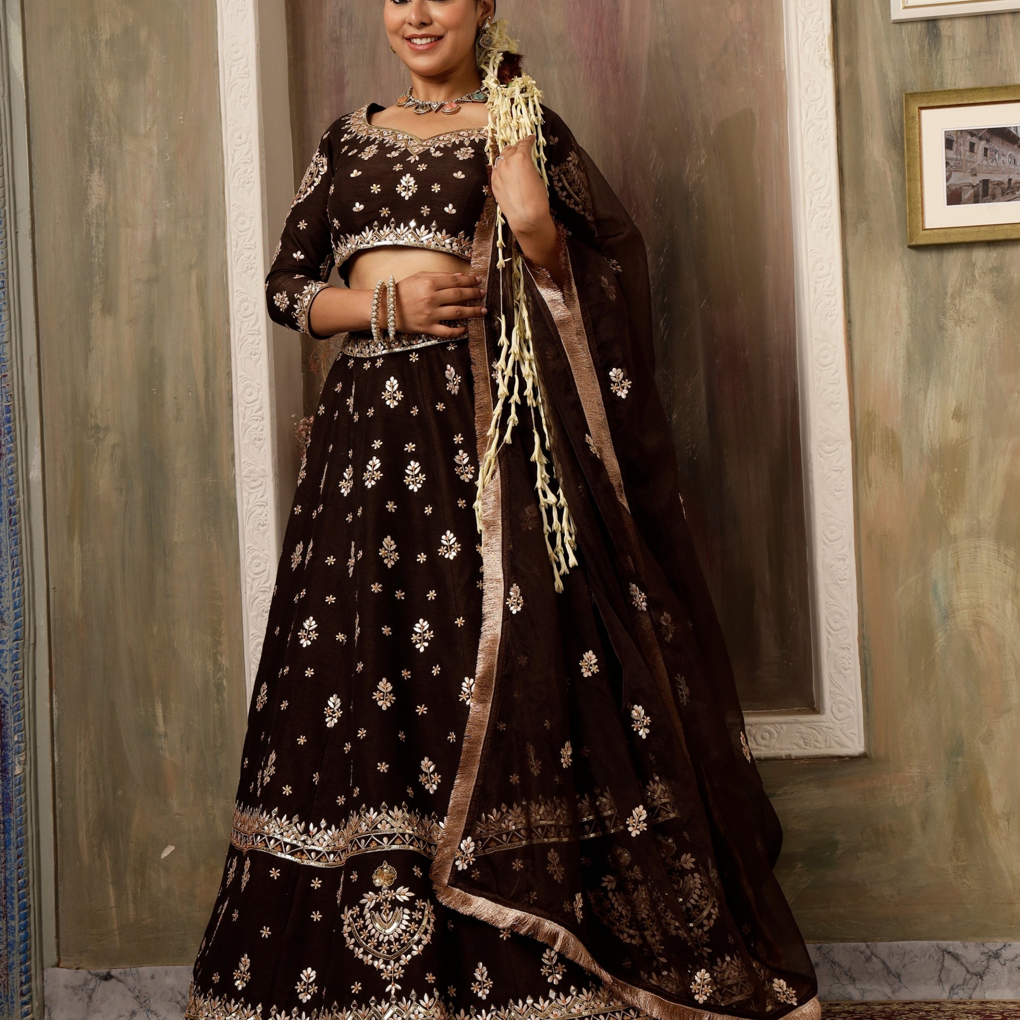 Emerald green block printed with hand embroidered lehenga set in silk