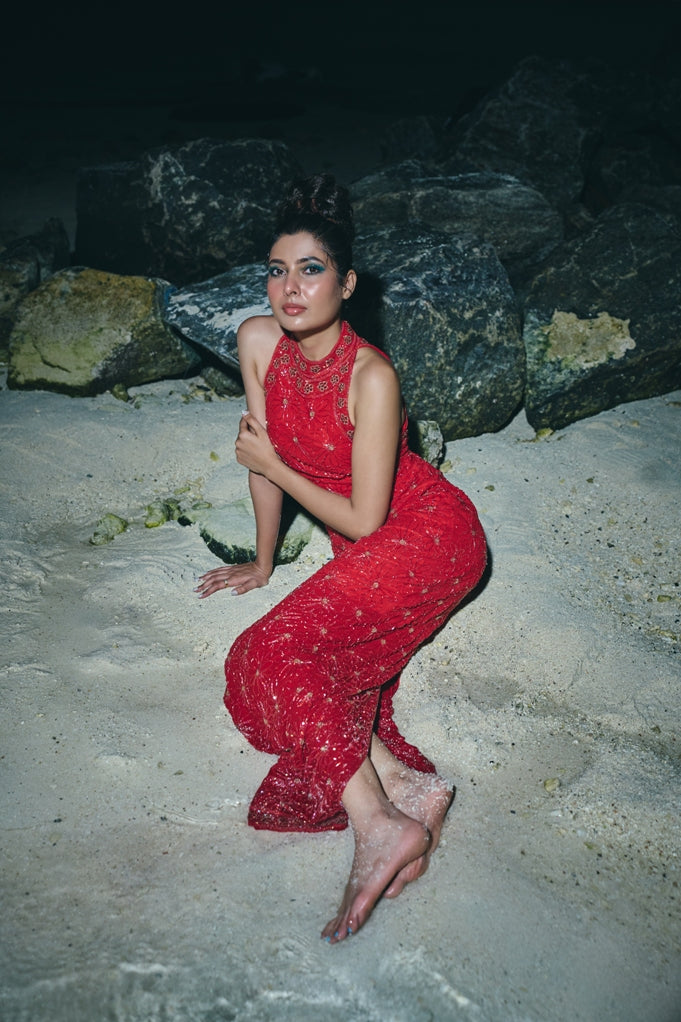 Red Halter neck embroidered tail gown in georgette