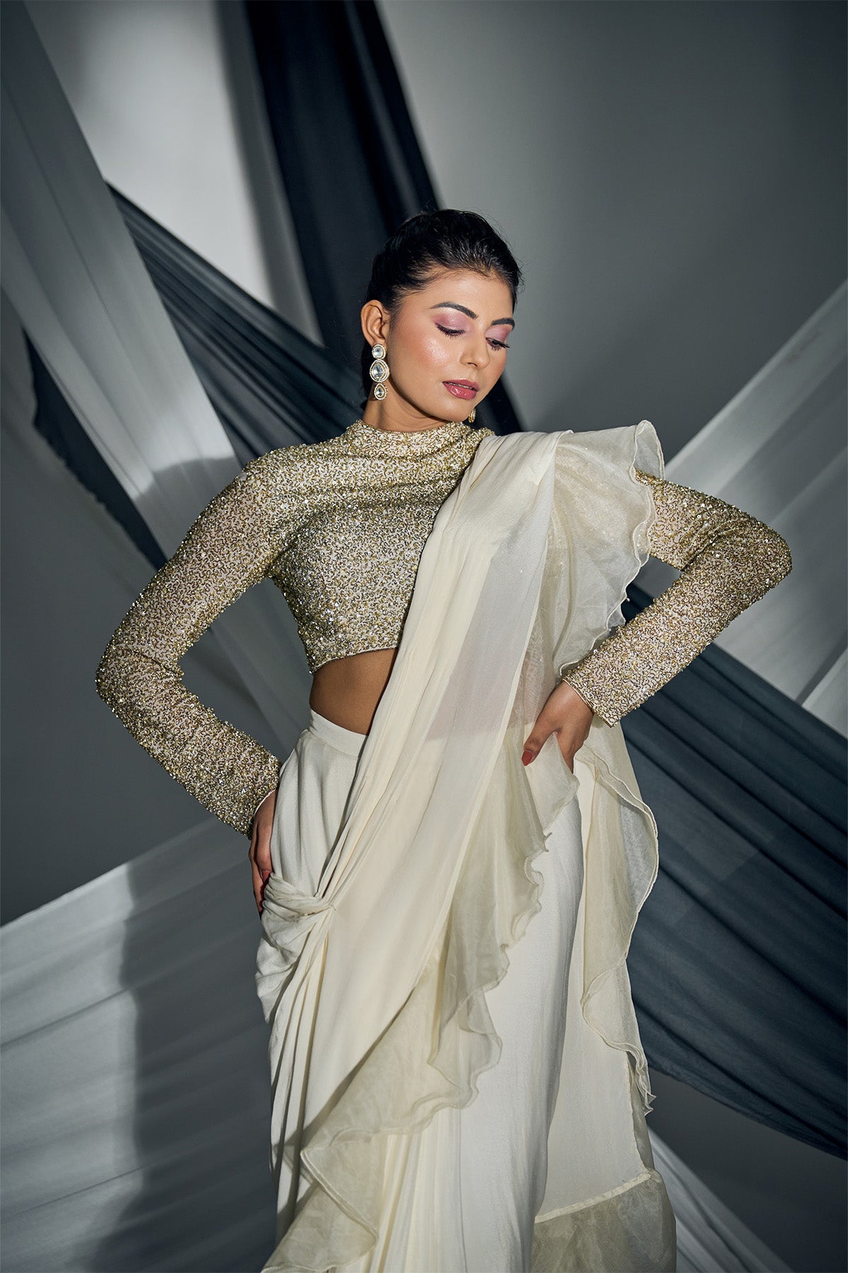White GEORGETTE Organza ruffle saree with fully beaded blouse