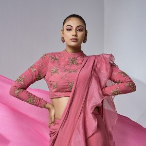 Rose pink organza ruffle saree with embroidered full sleeve blouse