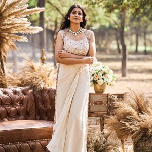 Ivory dhoti skirt with embroidered blouse and shrug in gorgette