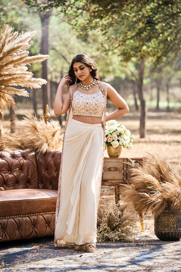 Ivory dhoti skirt with embroidered blouse and shrug in gorgette