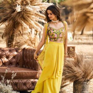 Yellow dhoti skirt with hand embroidered blouse and shrug in crepe