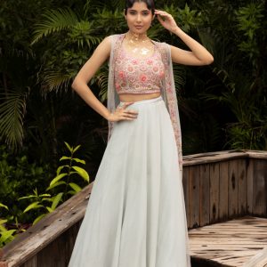 Pastel green skirt with mirror embroidered blouse and shrug in crepe