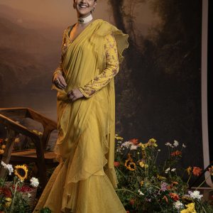 Yellow pre draped ruffle saree with embroidered blouse